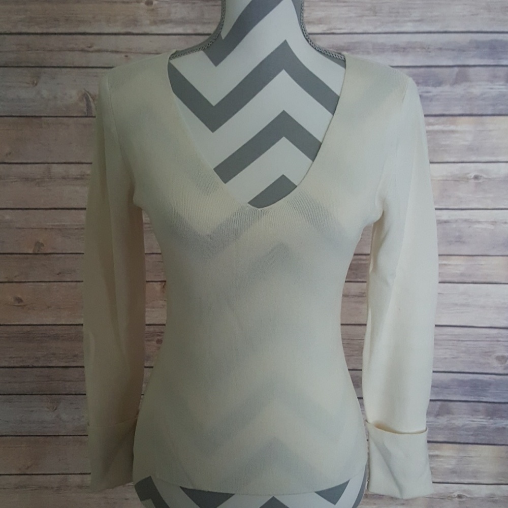 Cream sweater